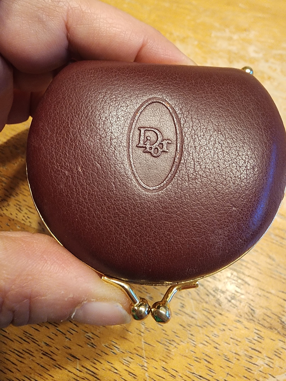 vintage Christian Dior maroon leather kiss-lock coin purse embossed Logo